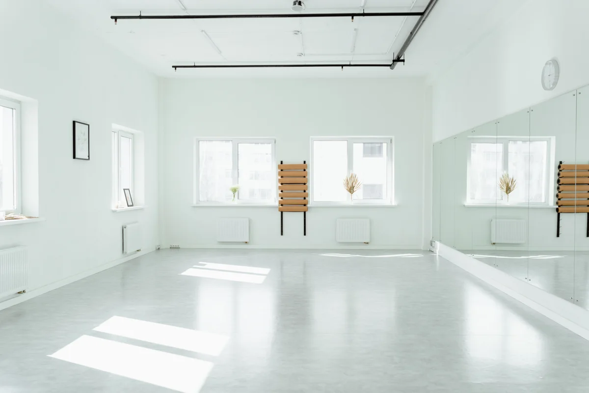 Full-height wall mirrors in a dance studio