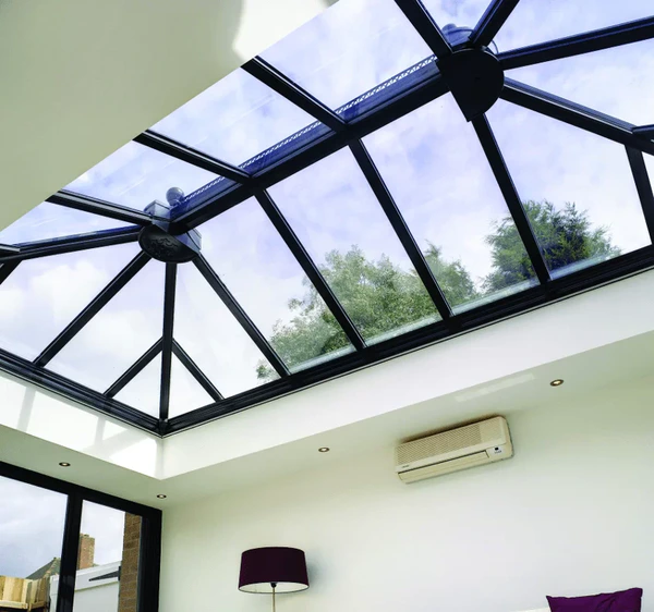 a kitchen with a glass roof